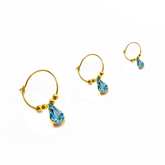 Orecchini a cerchio con goccia Swarovski acquamarina