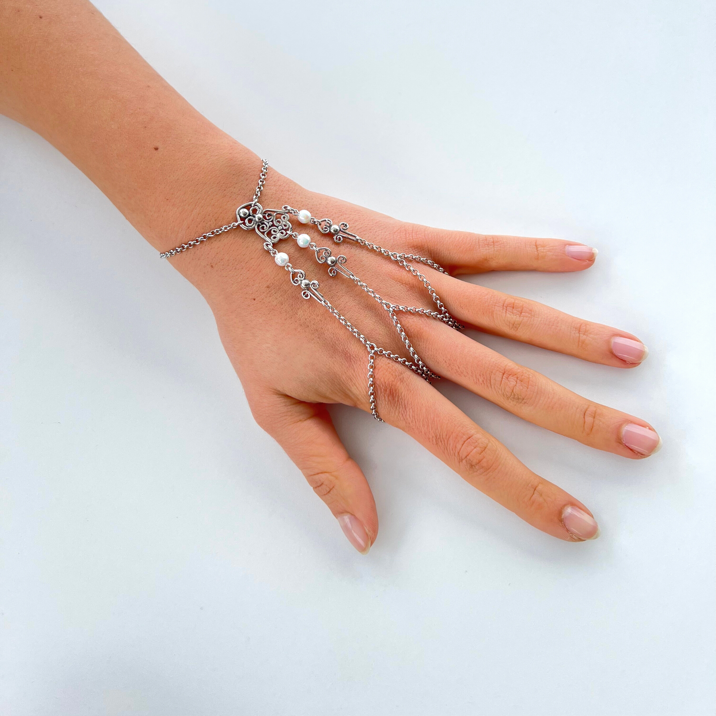 Bracciale baciamano con tre anelli