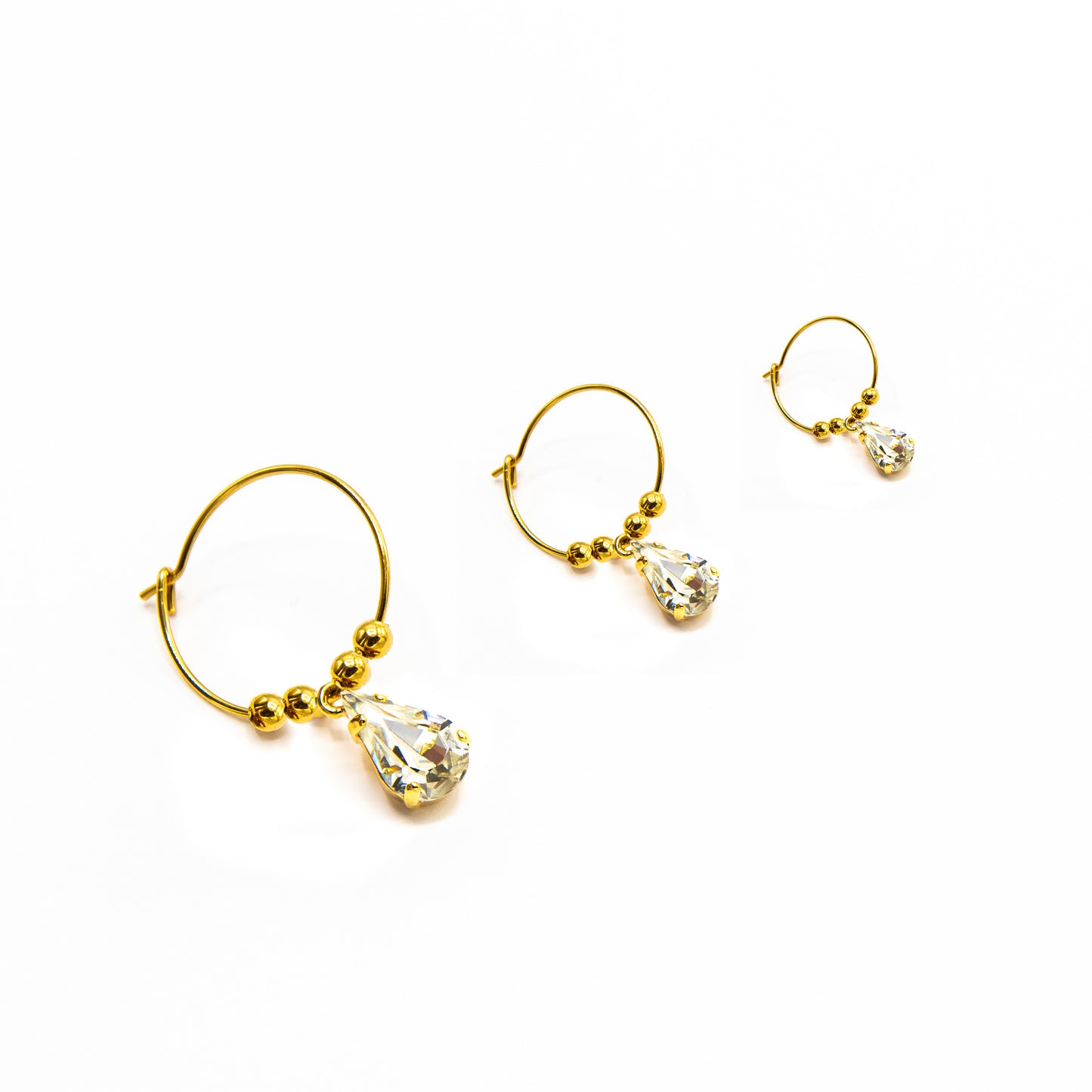 Orecchini a cerchio con goccia Swarovski bianca