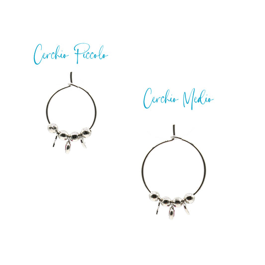 Orecchini a cerchio con ciondolo cuore e stella